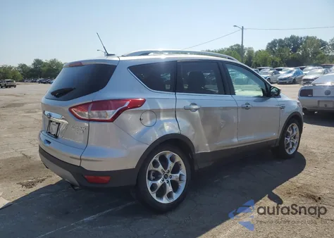 2016 Ford Escape Titanium z USA, uszkodzony, nr VIN 1FMCU0J93GUC64715